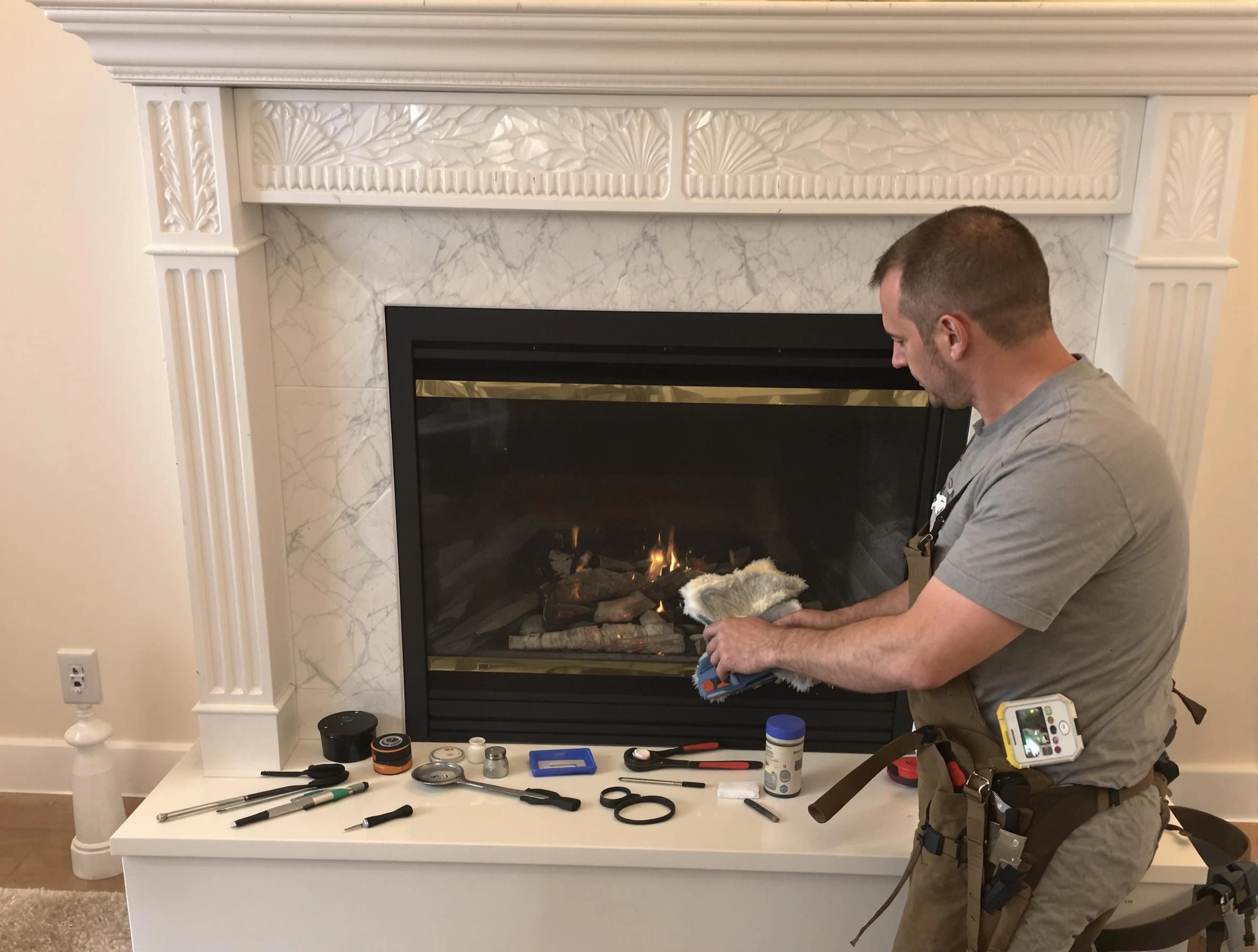 Neptune Chimney Sweep performing fireplace maintenance in Neptune, NJ